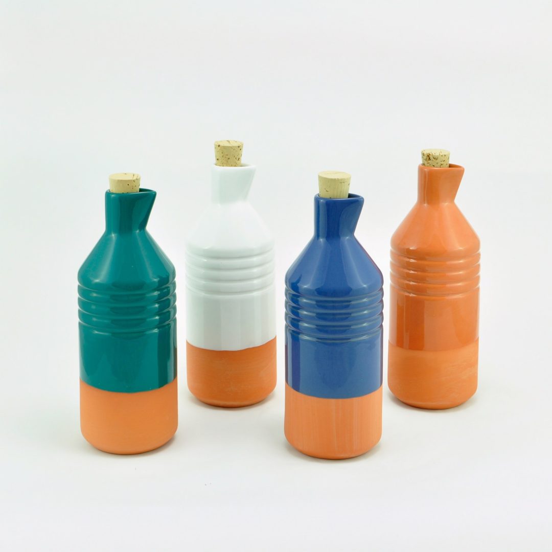 Orange two-tone glazed clay bottle